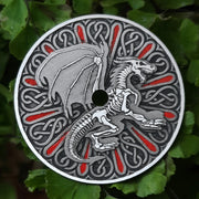 Dial Contains an image of a dragon skeleton and an ornament in the background. The hour markers are inscribed in the ornament and highlighted with red enamel.